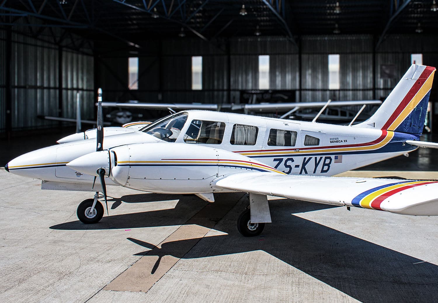 A Piper Seneca II, the school's turbocharged twin, on the apron